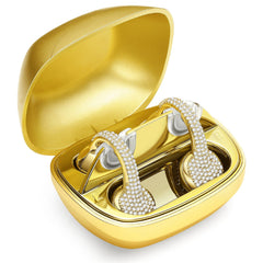 Gold earbud case with gold and silver earbuds on a white background