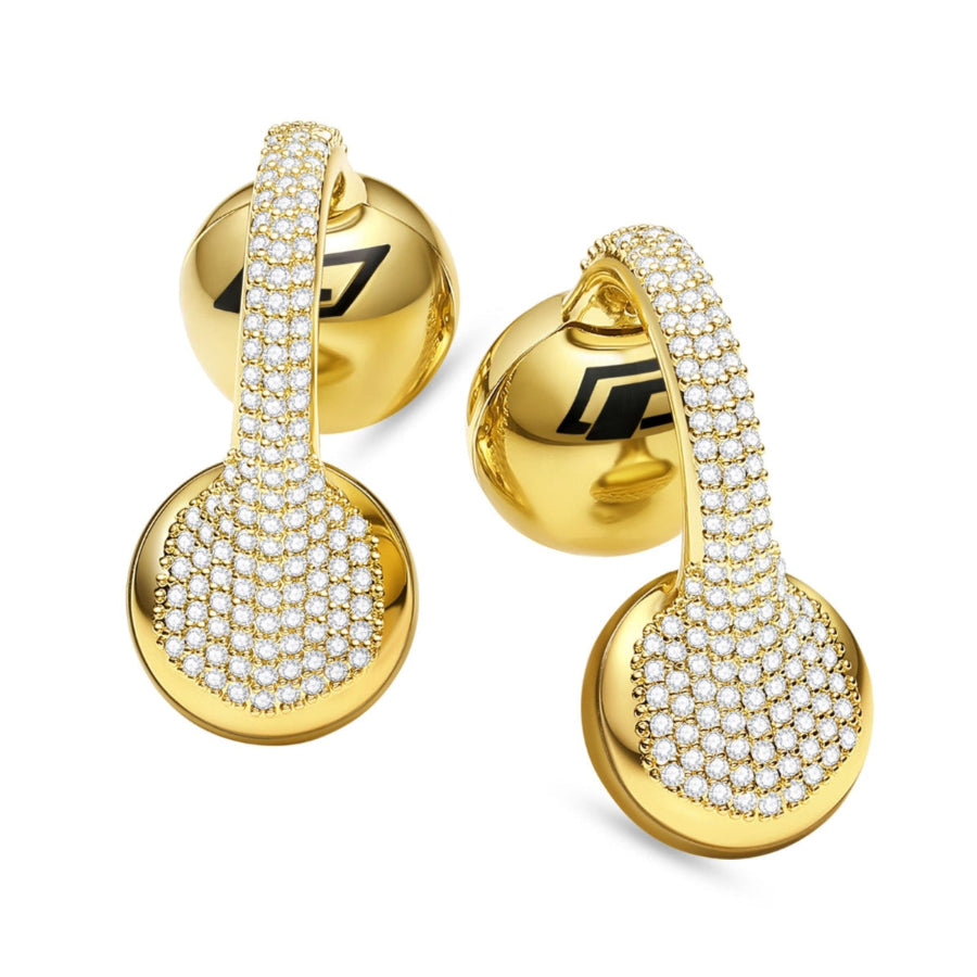 Gold hoop earrings with clear gemstones on a white background