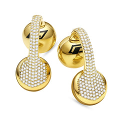 Gold hoop earrings with clear gemstones on a white background