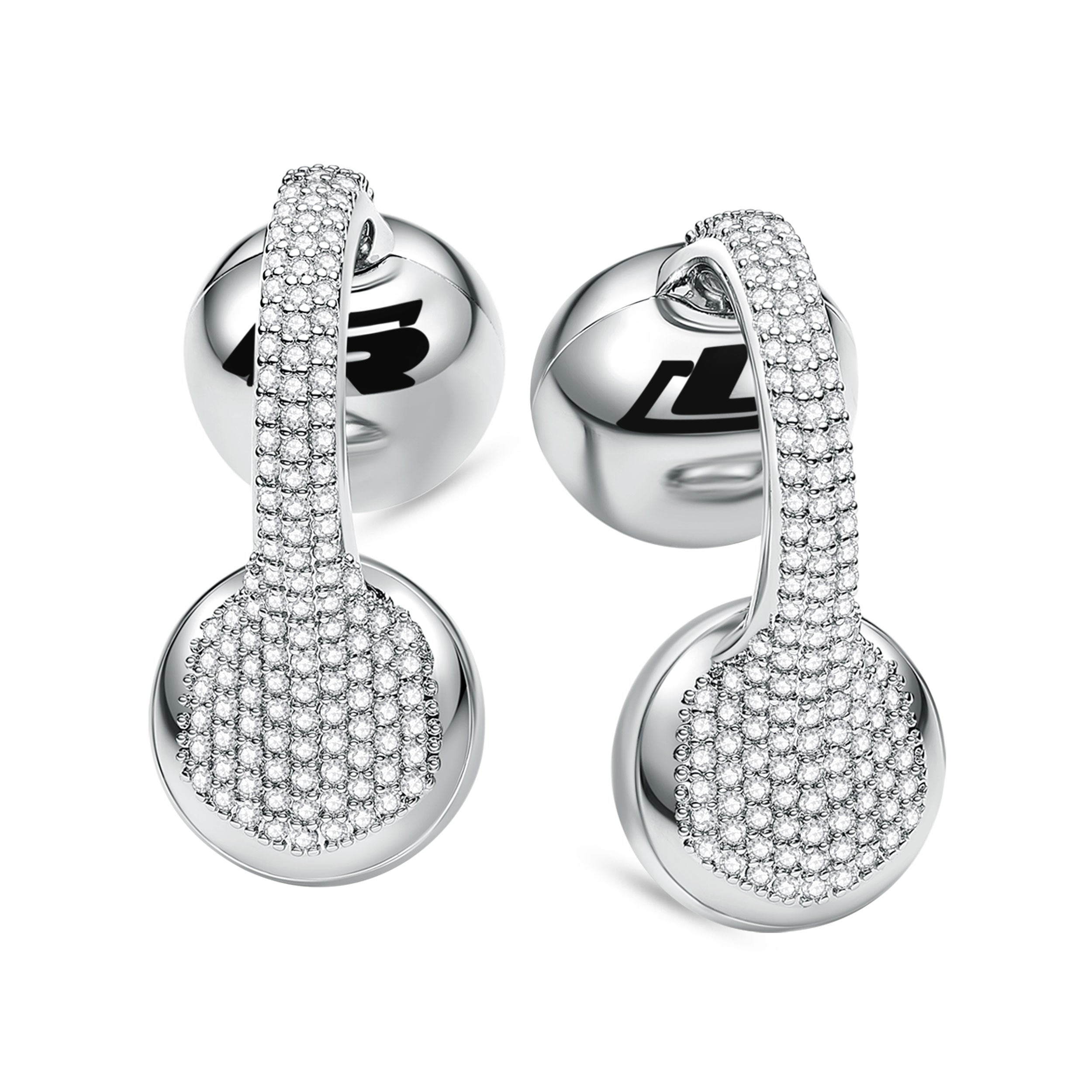 A pair of white gold clip-on earbuds with a diamond-like pattern on the surface.