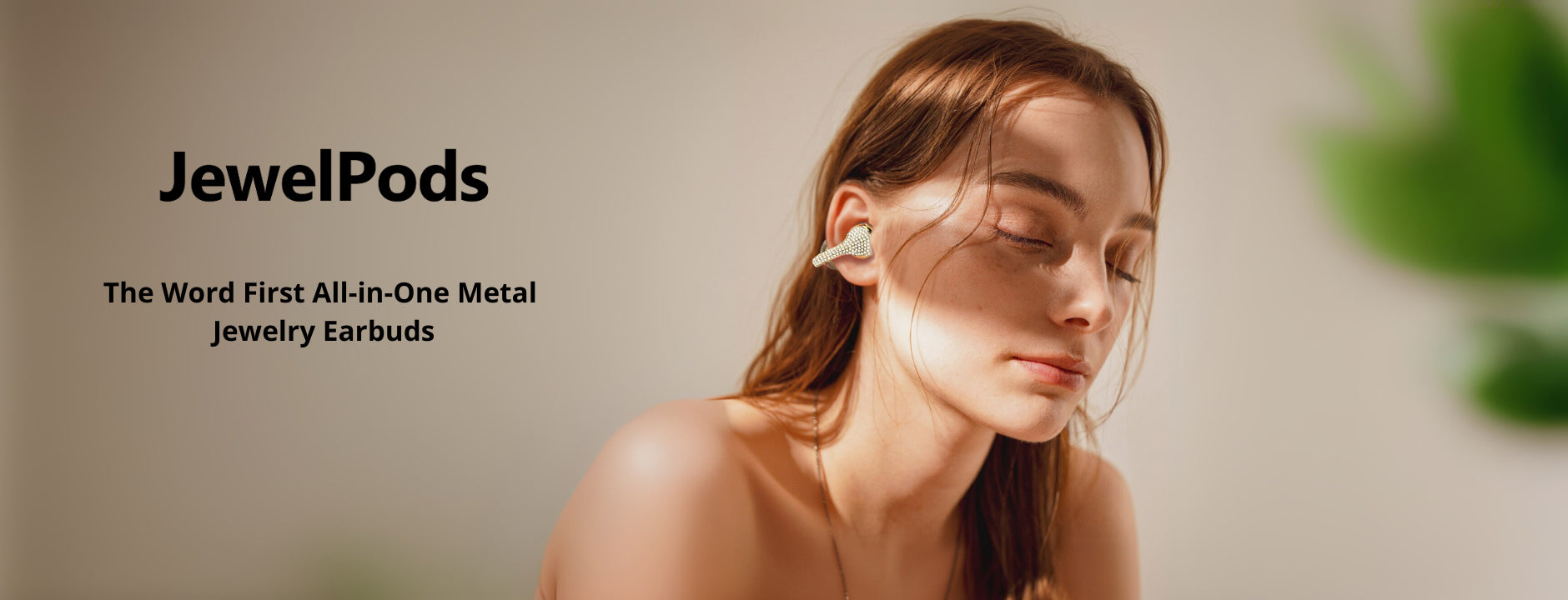 Woman wearing JewelPods earbuds with a neutral background